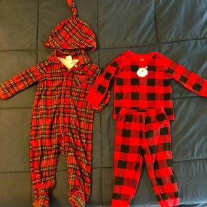 Like- new two Christmas pajama sets. Size 12 m
